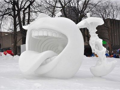 Does this amazing snow sculpture in Quebec City make you want to take a running dive right into that mouth?