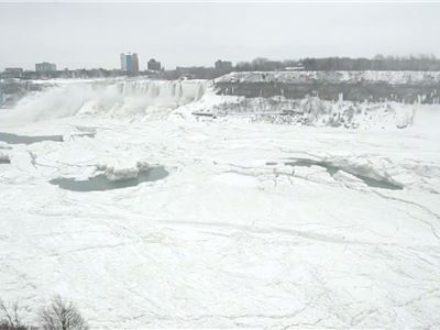 Water still cascades over nearly frozen Niagara Falls