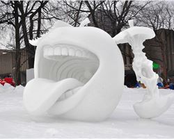 Does this amazing snow sculpture in Quebec City make you want to take a running dive right into that mouth?
