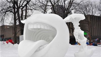 Does this amazing snow sculpture in Quebec City make you want to take a running dive right into that mouth?