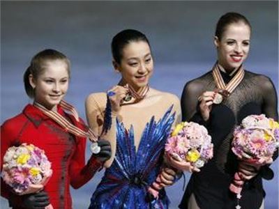 Three beautiful female athletes on the podium at the World Championships  in Japan.